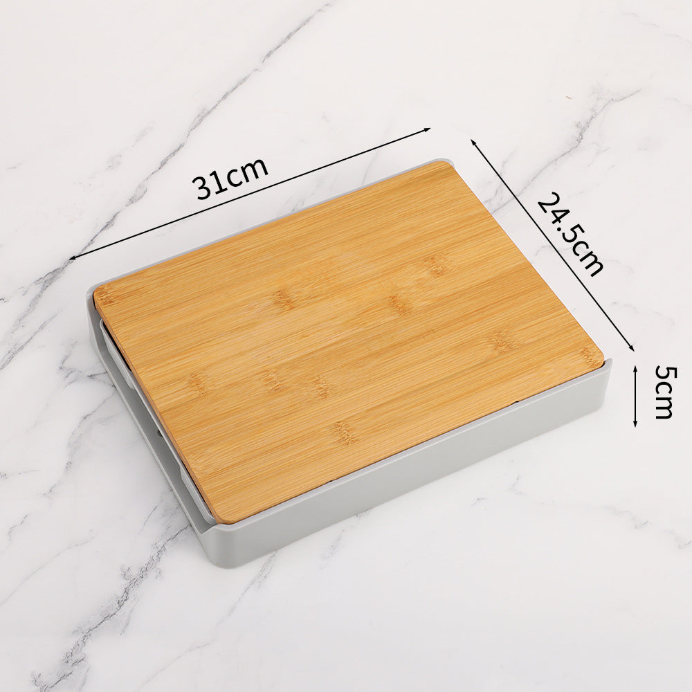 Wooden cutting board with dimensions on a marble background
